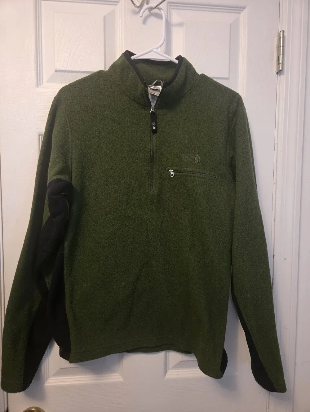 The North Face green fleece quarter zip sweatshirt in size L